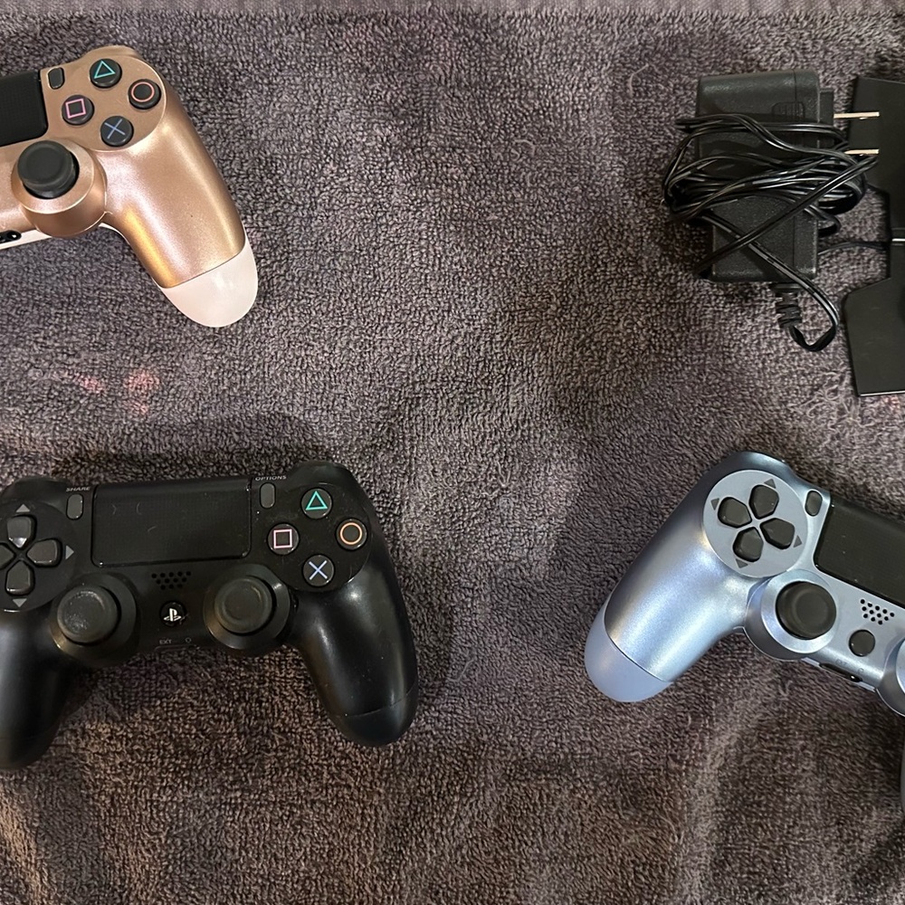 PS4 controllers…one pink and one blue only